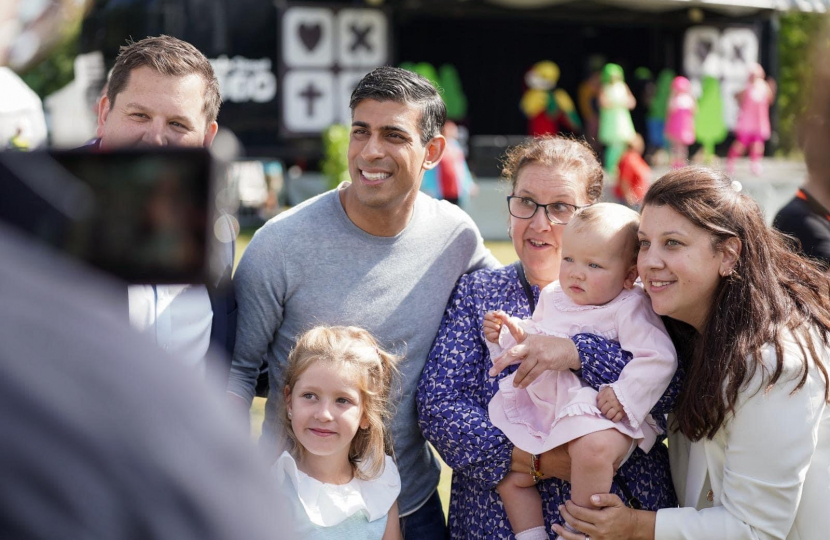Prime Minister Rishi Sunak with Louie French and local family